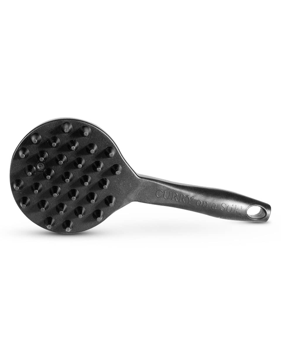 Curry on a Stik’ grooming and massage tool for animals